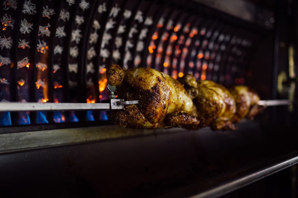 Chicken cooking on the Pickett's Deli rotisserie