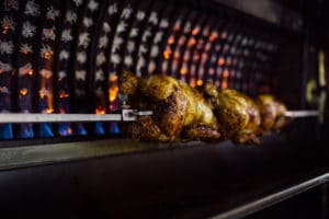 Chicken cooking on the Pickett's Deli rotisserie